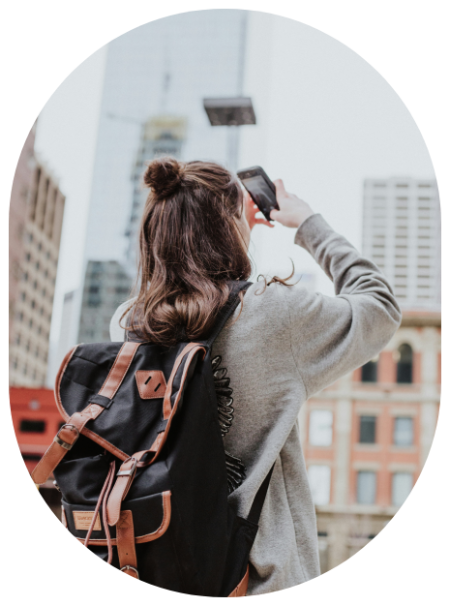 Girl taking photos of the sky